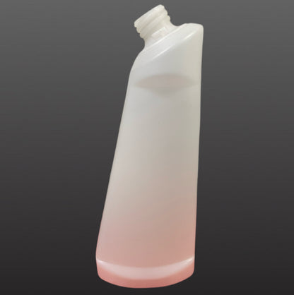 Cleaning cream bottle with angled head